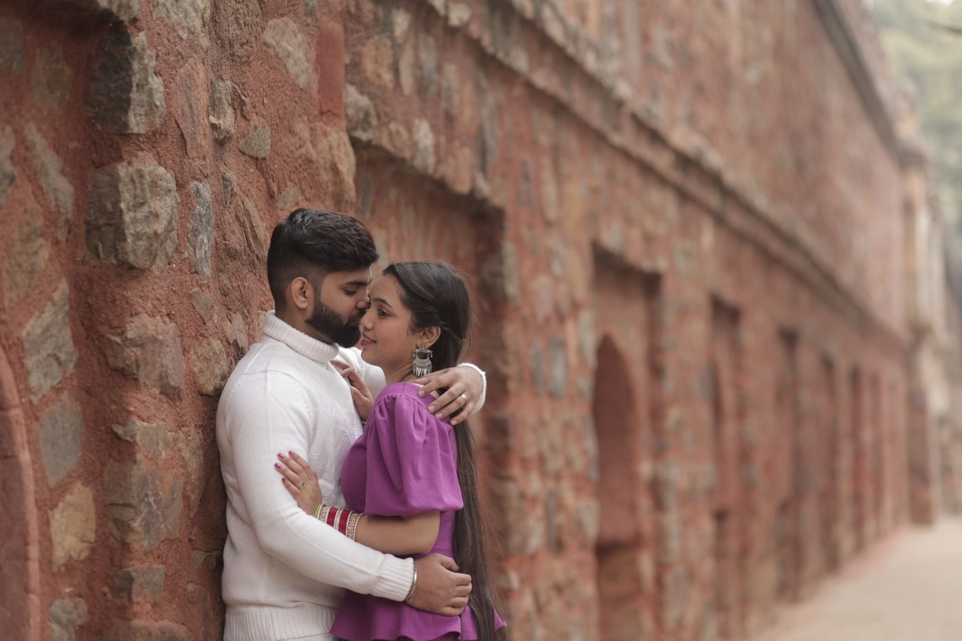 Couple at a sandstone haveli near Falna, Rajasthan